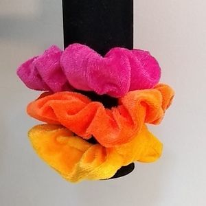pack of three scrunchies (pink,orange, and yellow)
